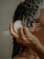 Rosemary essential oil, argan oil, and jojoba oil in a sulfate-free shampoo bar for all hair types.