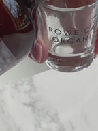 Pouring Vitality Energy Support, a natural energy supplement for low energy, fatigue, focus, and sustained energy.